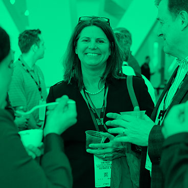 woman networking at NFMT event
