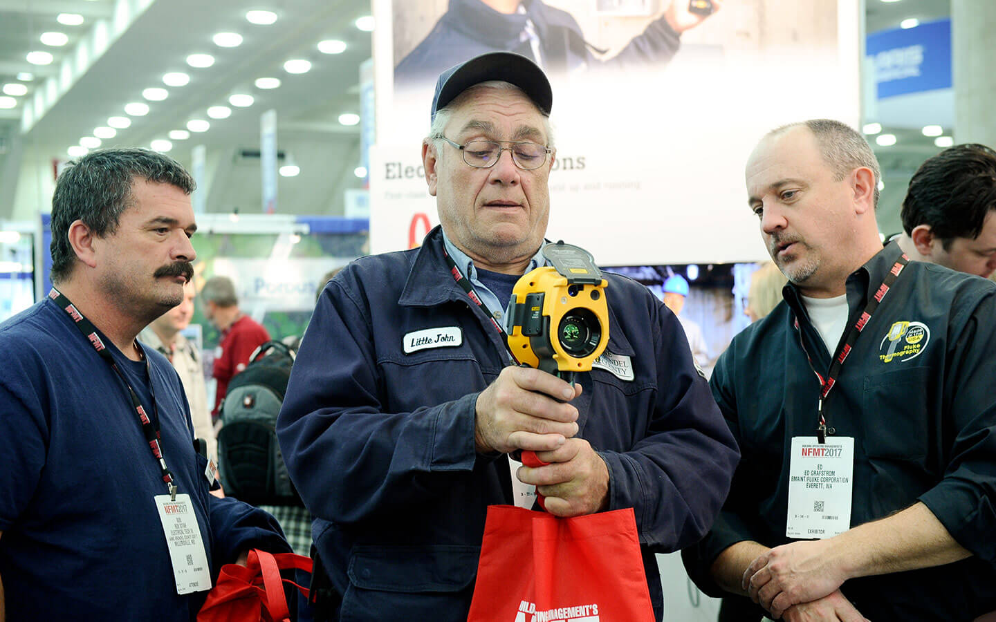 Man looking through thermal imaging camera