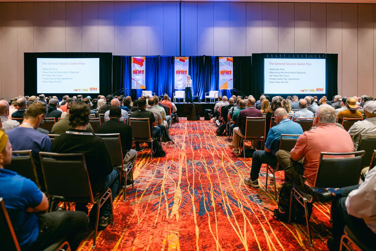 A packed General Session audience at a National Facilities Management & Technology event